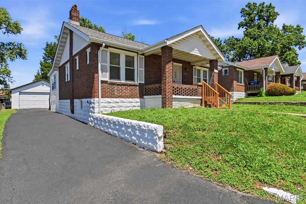 Photo of 8221 Toddy Avenue, St John, MO 63114 (MLS # 26037686)