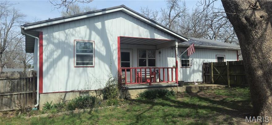 Comfortable 3-bedroom, 1.5-bath single-level home conveniently located on a corner lot right in town! Home has durable metal siding and a metal roof providing long-lasting, low-maintenance living, while major updates—including a new HVAC system with central air and a hot water heater installed in 2022—offer peace of mind.
The kitchen comes fully equipped with appliances that stay, making move-in easy. A bonus room in the converted garage adds flexible space perfect for a home office, hobby room, playroom, or extra living area.  Privacy fenced yard, situated on a corner lot.
Best of all, you’ll love the convenient location near schools, shopping, the city park, and the community pool—everything you need just minutes away!

Don’t miss this great opportunity to own a comfortable, well-maintained home in a fantastic in-town location.