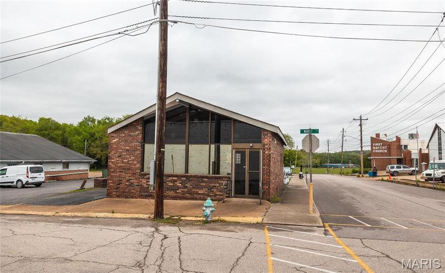 Presenting an exceptional commercial opportunity in the bustling heart of downtown Waynesville! This conveniently located building offers 875 square feet of versatile space, ideal for a range of business ventures. Boasting a coveted drive-through window, this property is perfectly poised to cater to the needs of discerning clientele seeking convenience and efficiency. Additionally, seize the chance to elevate your business operations with the option to purchase commercial freezers and other essential equipment, streamlining your setup and enhancing your offerings. Don't miss your chance to establish your presence in this prime location, where high visibility and foot traffic ensure maximum exposure for your enterprise. Unlock the potential of this dynamic space and set your business on the path to success in downtown Waynesville! Location: Corner Location, Downtown, High Traffic