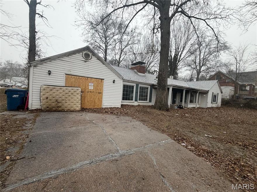 2 bedroom 1 bathroom home for sale. This home could use some TLC and is on a great lot with mature trees.  Sold AS IS