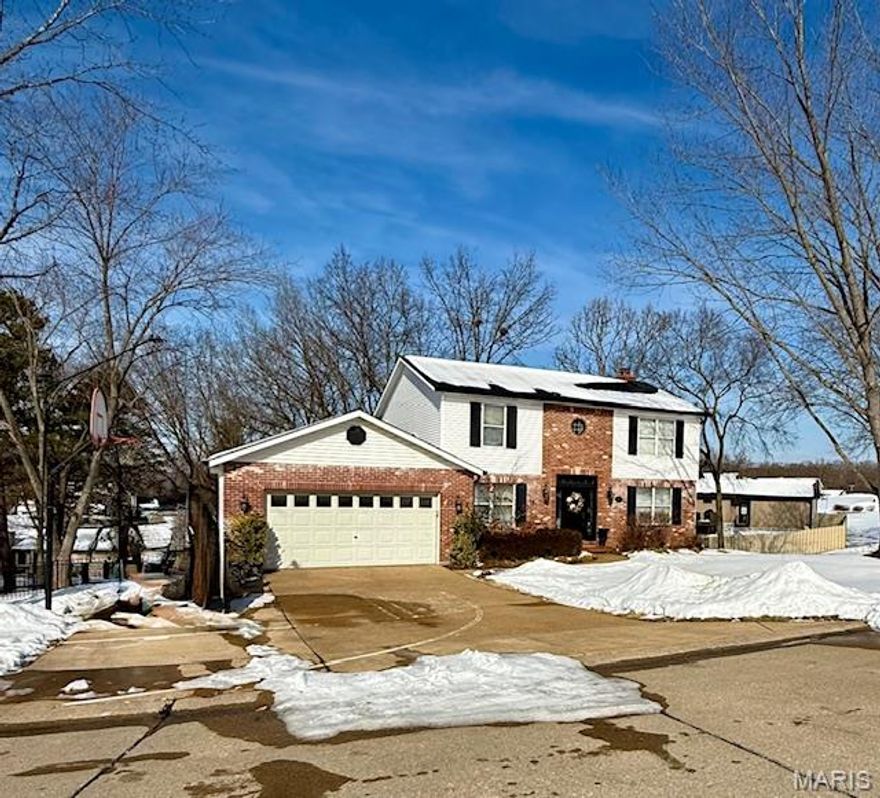 Beautiful 4-bedroom, 3.5-bath home located in a desirable subdivision close to schools. This well-maintained property offers an open floor plan with spacious living areas that flow seamlessly, making it ideal for both everyday living and entertaining.  The kitchen opens to the main living space and features ample cabinetry and counter space. Large windows throughout the home provide abundant natural light. Upstairs you'll find generously sized bedrooms, including a comfortable primary suite with a private bath. The finished basement adds valuable living space and includes a bar area, perfect for entertaining. A walk-out leads directly to the covered patio, extending your gathering space outdoors.  Enjoy the newer deck overlooking the fenced backyard, offering room to relax and play. Additional highlights include a newer roof, gutters, paint, ample storage, and a functional layout designed for today's lifestyle.    Move-in ready and offering over 2,000 sq ft of living space, updates, and almost a half acre lot located in a fantastic location-this home is a must-see!