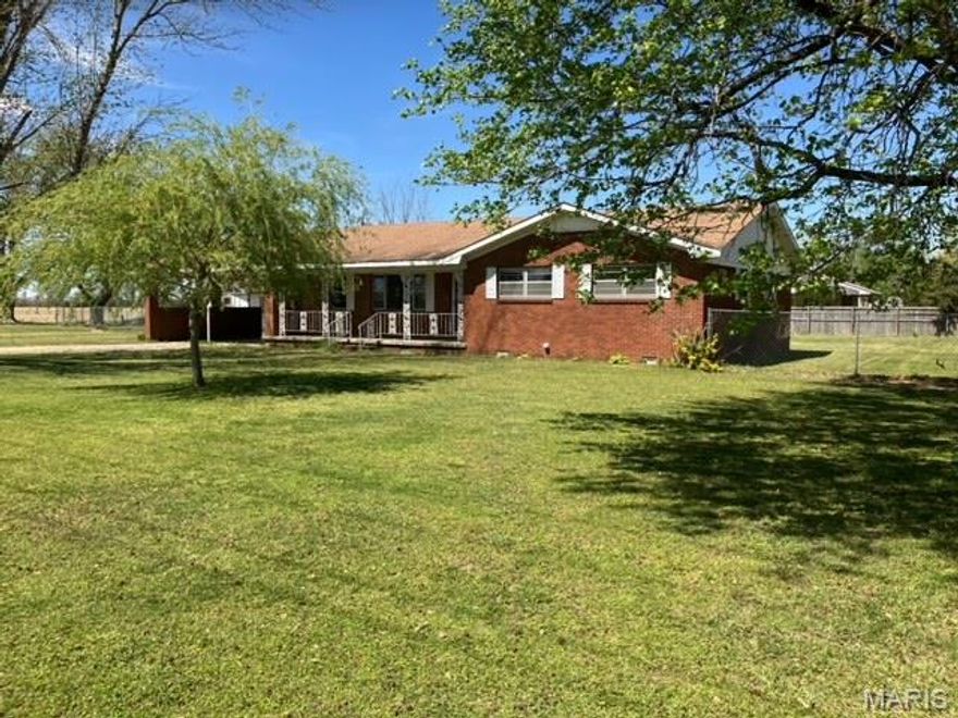 All brick home, outside city limits, county water and septic. All electric, three bedroom, two full bathroom and half bath, living room, dining room, kitchen, laundry room and mud room. Enclosed back porch, Two car carport attached, and backyard fenced. Kitchen appliances staying are counter cooktop, wall oven and dishwasher. Additional Rooms: Mud Room