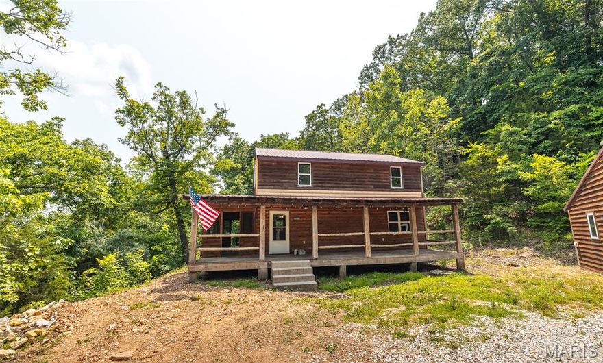 This 3-bedroom, 2-bath cabin strikes a great balance between rustic style and modern updates. It’s located in a small, private river community with secure access through an electric gate. The home features a full master suite on the upper level and recent upgrades throughout. As part of this quiet community, you’ll have access to a private boat ramp on the Gasconade River just minutes from the house—perfect for fishing, floating, or spending time on the water. Whether you're looking for a weekend place or a full-time home, this property offers comfort, privacy, and easy river access in a low-traffic setting.