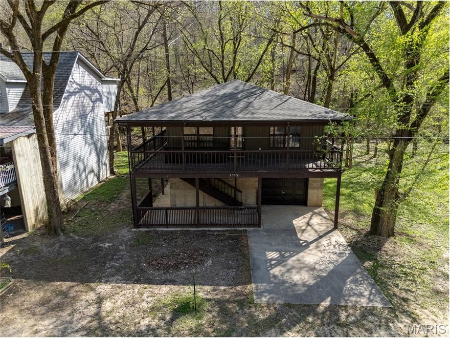 Welcome to your dream river retreat! This beautifully remodeled 3-bed, 2-bath home is just a short walk from the Gasconade River, offering endless opportunities for outdoor adventure, relaxation & recreation. Whether you're an avid angler, kayaking enthusiast or just love the peaceful sound of nature, this location is a rare find. A public boat ramp is conveniently located just down the street, making river access effortless. Step inside to an open & airy floorplan featuring luxury vinyl plank flooring throughout the home. The kitchen has been thoughtfully updated with white cabinetry, black granite countertops & a spacious center island—perfect for hosting friends and family. The layout flows seamlessly into the living & dining areas, creating a comfortable & functional space for everyday living or weekend getaways. All bedrooms are generously sized & the bathrooms have been tastefully updated to match the home’s modern rustic charm. Outside, the wrap-around porch offers the perfect spot to sip your morning coffee or listen to the gentle babble of the creek that runs behind the property. Surrounded by nature & just moments from the water, this home offers a true escape from the hustle & bustle while still providing all the modern comforts you need. Whether you're looking for a full-time residence, a weekend getaway, or a short-term rental investment, this river-close home is a must-see. Don't miss the chance to own a piece of tranquility near the beautiful Gasconade River!
