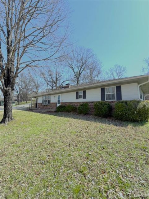 Photo of 1401 Hull Valley Drive, Waynesville, MO 65583 (MLS # 26016539)