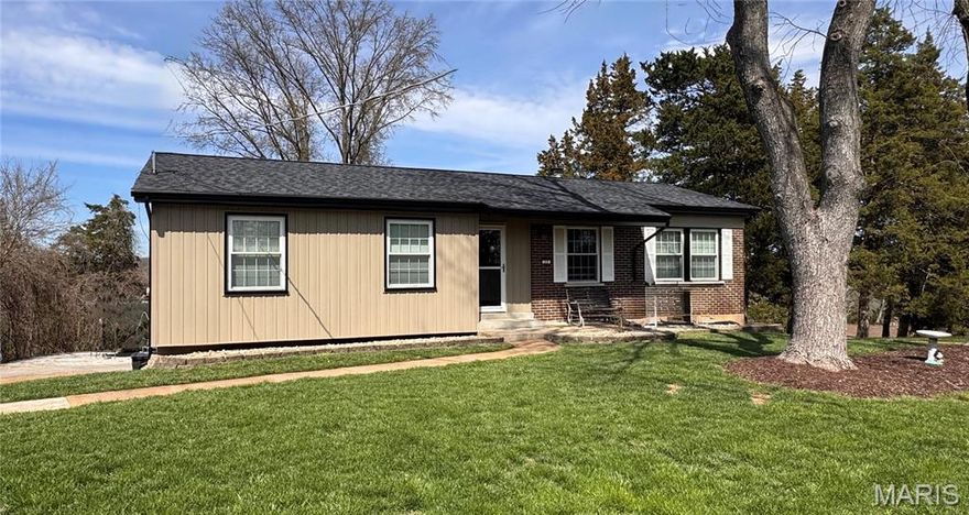 Welcome home to this charming 3-bedroom, 2-bathroom mostly brick home tucked away on a quiet cul-de-sac in desirable Fenton, Missouri within the Fox C-6 School District. Situated on nearly half an acre, this property offers the perfect balance of privacy and convenience, just minutes from the shopping, dining, and entertainment at Gravois Bluffs.
Inside, you'll find a warm and inviting living space featuring a cozy wood-burning fireplace—perfect for relaxing evenings. The home also offers a rear two-car tuck-under garage providing ample parking and storage. Step outside to enjoy the covered back deck, ideal for entertaining, grilling, or simply taking in the peaceful backyard setting.  The lower level just had new carpet installed.  Major exterior updates provide peace of mind, including a brand-new roof with long wear architectural shingles, gutters with screens, downspouts, and vertical vinyl siding. With its spacious lot, quiet location, and convenient access to everything Fenton has to offer, this home is one you won’t want to miss.  There is nothing to do other than MOVE IN!