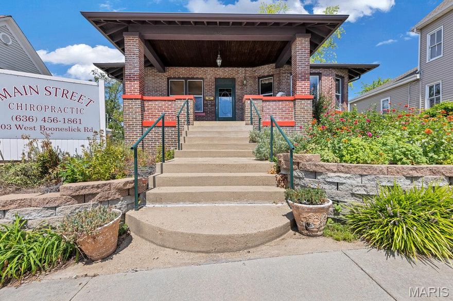 PRIME MAIN STREET COMMERICAL/RESIDENTIAL OPPORTUNITY – 1,528 Sq Ft – C2 Zoning!!! Don’t miss this incredible opportunity to own a historic all-brick building on Main Street! Built in 1920, this charming property retains much of its original character, including beautiful woodwork that adds warmth and timeless appeal. Inside, you’ll find a spacious dining area filled with natural light, high ceilings throughout, and a unique butler’s pantry that adds both charm and functionality. The layout offers flexibility with 2 bedrooms and 1 bathroom, making it ideal for residential living or perfectly suited for conversion into a boutique business, office, or storefront. The attic provides potential for additional storage or living space, while the full basement offers even more possibilities for expansion or utility. Outside, the covered front porch creates a welcoming entrance, and the gravel lot in the back offers space for parking or future improvements with the right vision. Located in a high-visibility area with steady traffic flow, this property benefits from the vibrant energy of Main Street. Community events bring visitors and potential customers right past your door. And one more bonus—you’ll enjoy seasonal flowers all year long with no grass to mow! Schedule your showing today and imagine the possibilities this Main Street gem has to offer. Duplicate listing # 26013425