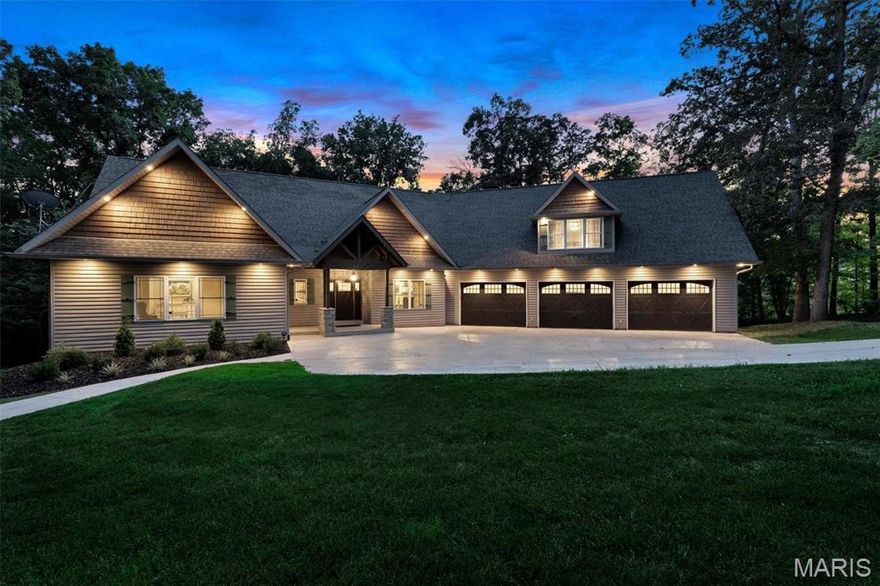 Experience the perfect blend of luxury and comfort in this stunning 6-bedroom, 5-bath estate set on nearly 8 acres of picturesque land. Every detail has been thoughtfully updated to impress. The remodeled kitchen is a chef’s dream, custom cabinetry, tiled backsplash, granite countertops, oversized refrigerator, and double ovens—ideal for entertaining. Step into the main floor living room, where vaulted ceilings create an airy atmosphere. French doors open onto an composite deck complete with an outdoor fireplace, perfect for gatherings or quiet evenings. The primary suite has coffered ceilings, his and hers walk-in closets, spa-inspired bathroom with double sinks, a tiled shower, and jetted tub. Above the garage, a 1,700 sq. ft. finished studio apartment, with a full kitchen and bathroom—ideal for guests or extended family. The walkout lower level offers additional space, with a spacious family room, three large bedrooms, and two full bathrooms. Car enthusiasts and hobbyists will appreciate the attached oversized, fully insulated three-car garage with pristine epoxy floors. The detached 5,000 sq. ft. insulated pole barn/workshop features concrete floors, three car bays, additional 1,000 sq. ft., partially finished office or apartment space. Properties like this are a rare find. Flexibility to run a business from home this estate delivers unmatched versatility and comfort. Take the next step toward making this unique residence yours—book your private tour today!