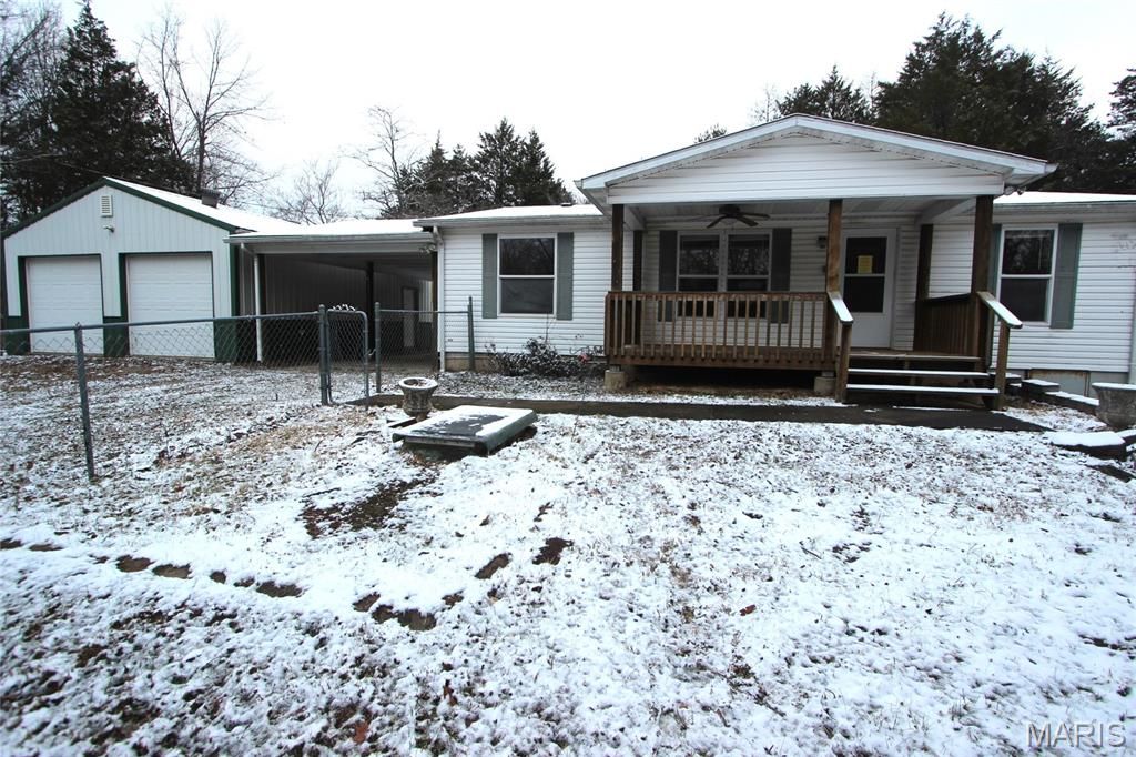 Photo of 8310 Rock Creek Road, Fredericktown, MO 63645 (MLS # 25080000)