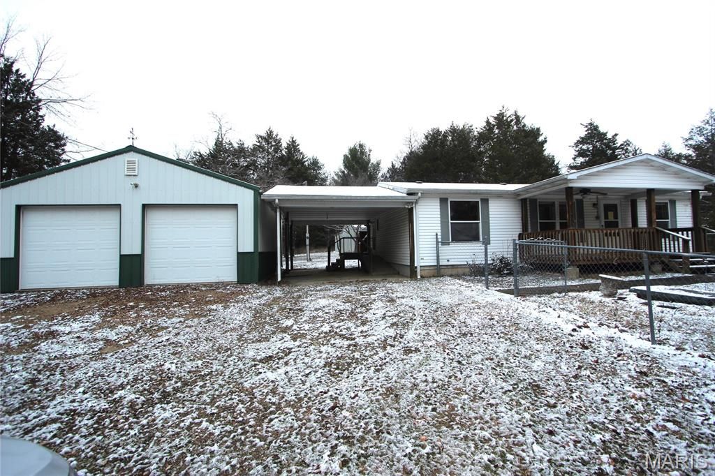 Photo of 8310 Rock Creek Road, Fredericktown, MO 63645 (MLS # 25080000)