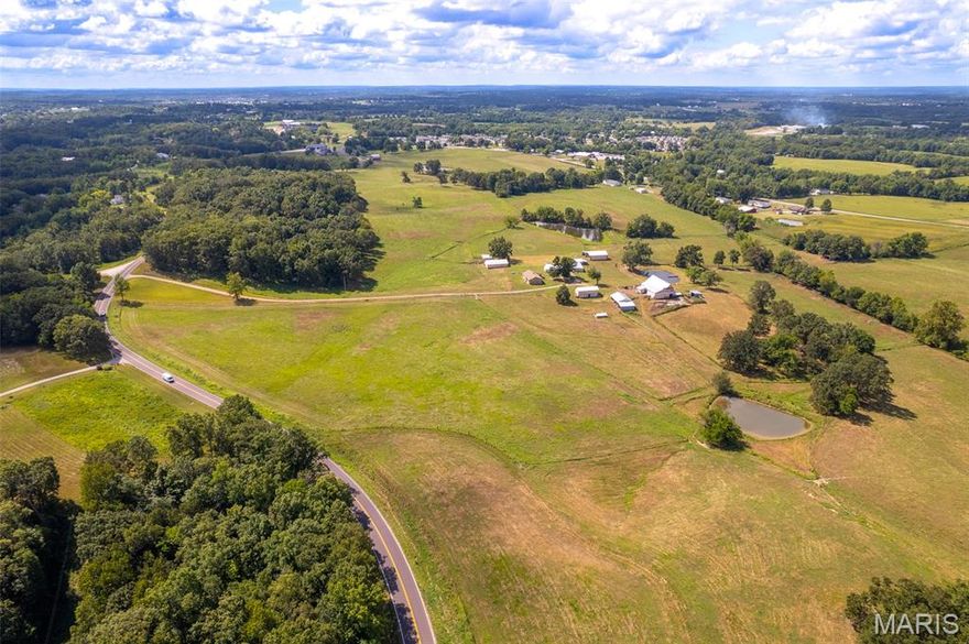 ***Auction – 111+/- Acres Offered in 3 Tracts or Combinations***
Saturday, October 4, 2025 • 12:00 PM • Jackson Civic Center – Jackson, MO
An incredible opportunity awaits with 111+/- acres in Cape Girardeau Co., selling at public auction in three desirable tracts or in combinations to suit your vision. These versatile properties offer premier location, excellent accessibility, and unlimited potential for farming, building, or development – all within the Jackson School District. Tract 1 – 36+/- Acres: Beautiful open pasture with Highway 61 frontage, creek frontage, fencing and cross fencing, and multiple phenomenal build sites offering sweeping views. Tract 2 – 15+/- Acres: A picturesque setting with Highway C frontage, a pond, creek frontage, fencing, and a hilltop build site overlooking the valley and water. Tract 3 – 60+/- Acres: A well-kept 1,131 sq. ft., 3-bedroom, 2-bathroom home built in 1962 surrounded by multiple outbuildings, lean-tos, equipment sheds, and a hay shed. This tract also includes 3 ponds, creek frontage, and fenced/cross-fenced pasture – ideal for livestock or hobby farming. Each tract offers excellent development possibilities with public water available, public sewer nearby, and electric on site. Unincorporated and unrestricted, these properties provide both freedom and flexibility for future use. Whether you’re looking for a homesite, farm, or investment, this auction represents a rare chance to secure prime land in a sought-after location.