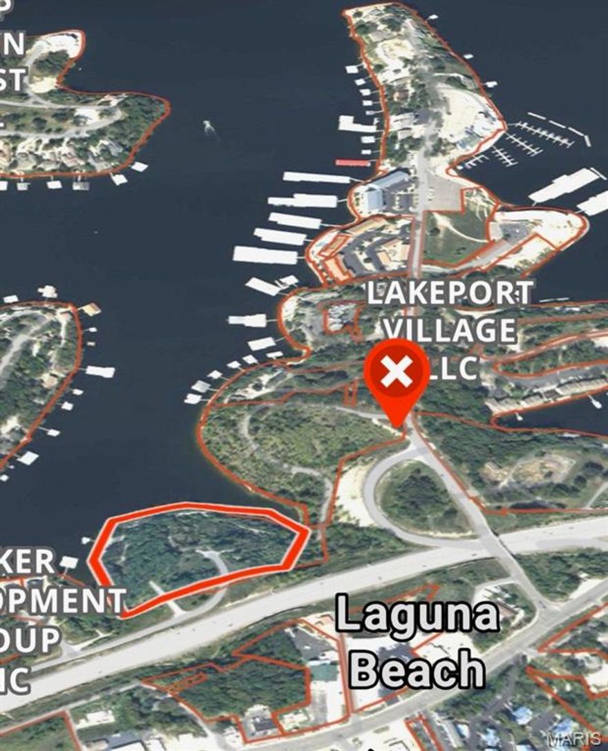 Exclusive Lake Ozark Waterfront Development Opportunity!! Experience one of the last great pieces of prime shoreline real estate on Lake of the Ozarks. Spanning 8.5  acres with over 1,800 feet of pristine waterfront, this property offers endless potential for a luxury resort, marina, or private estate enclave. Situated along prestigious Jeffries Street, these commercial and waterfront lots combine elite accessibility with breathtaking panoramic views.  Highlights of property include: Gently sloping terrain ideal for luxury builds, exceptional water frontage and sunset exposure and rare large acre offering in the heart of Lake of Ozarks. All utilities nearby and easy highway access. Seller will divide