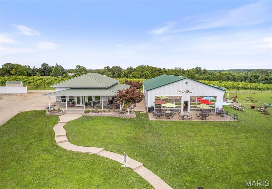 Embrace the chance to continue a legacy of hospitality and fine wine in a picturesque setting. Only an hour south of St. Louis. This family-owned business offers an inviting atmosphere for wine enthusiasts and casual visitors alike. Twin Oaks Event Center & Winery located just outside of Farmington  This turn key operation has 4.5 acres of vines and addt'l Orchard land. The Tasting Room has a turn-of-the-century bar, cozy fireplace, kitchen and has a wraparound porch. The indoor/outdoor Glass House overlooks the tranquil pond and the vines, has a large kitchen, bar and hosts numerous events. The Grande Oaks Event Center is the newest building and is the prefect place for a wedding or corporate event with a full kitchen, dance floor, stage, brides room and can seat up to 350 guests. The wine cellar comes complete with stainless steel tanks and the equipment used in the wine making process. Call for more information and details about this stunning property and business.
