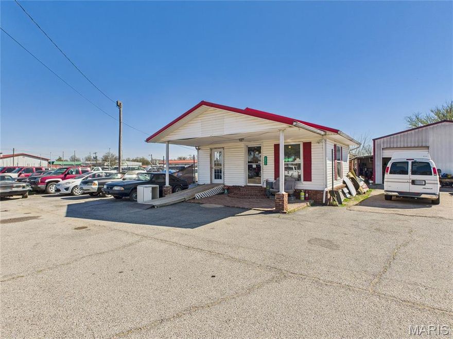 Positioned along Highway 25 and adjacent to the Malden Country Club, 2892 N Douglass St. offers exceptional visibility and versatility for a wide range of business ventures. Currently operating as a high-volume car dealership and mechanic shop, this property presents a unique opportunity for investors to continue in the automotive space or repurpose the site for a myriad of other uses. The sale of the property can include the thriving business along with a majority of its impressive inventory of over 250+ vehicles—featuring everything from durable pickup trucks to high-end racing cars. This offer will be presented through multiple listings, with flexibility for buyers to purchase the property in separate parcels, making it an ideal fit for a variety of investors.