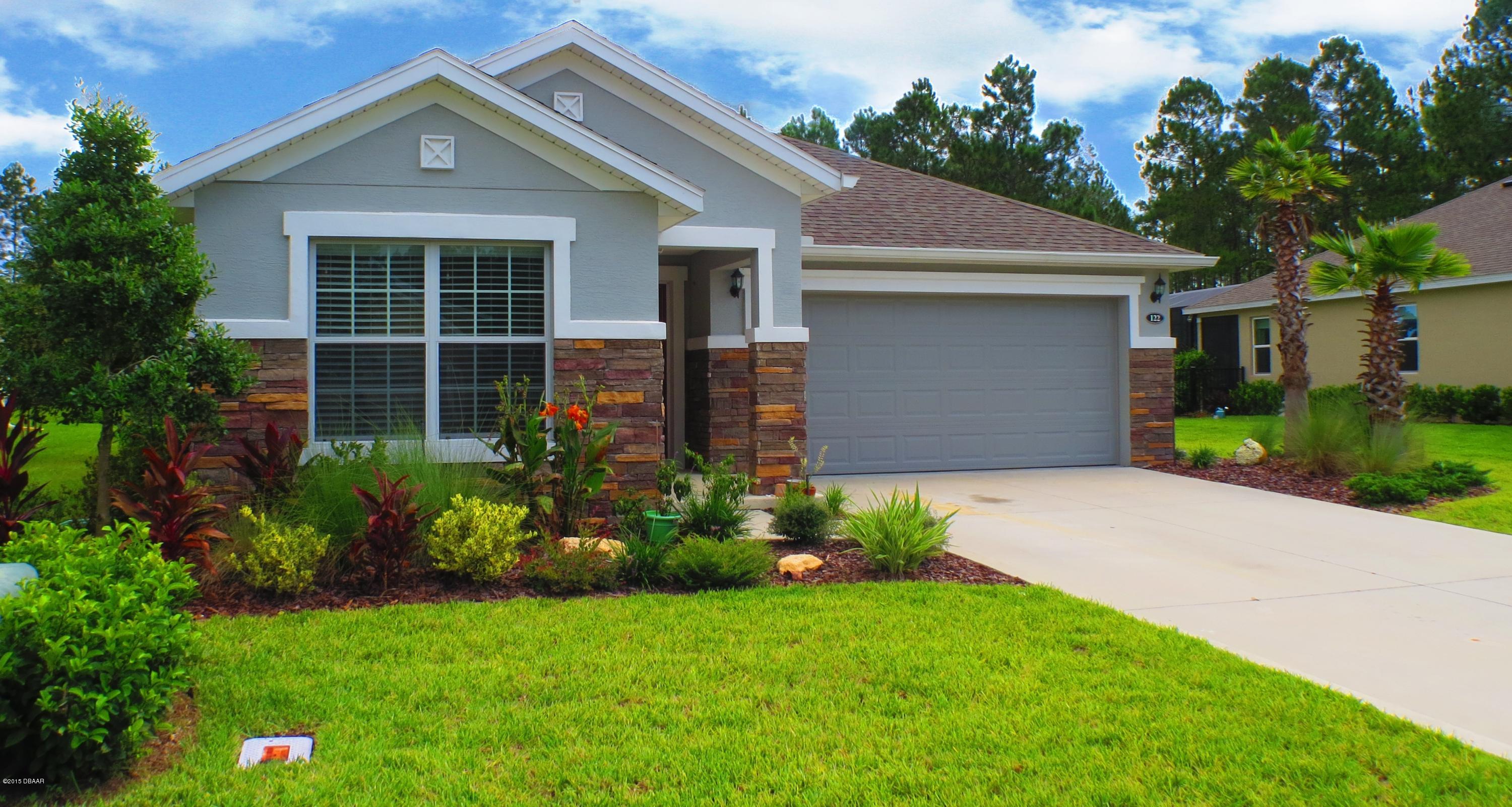 Photo 1 of 17 — 122 S HUMMINGBIRD Place, Palm Coast, FL 32164