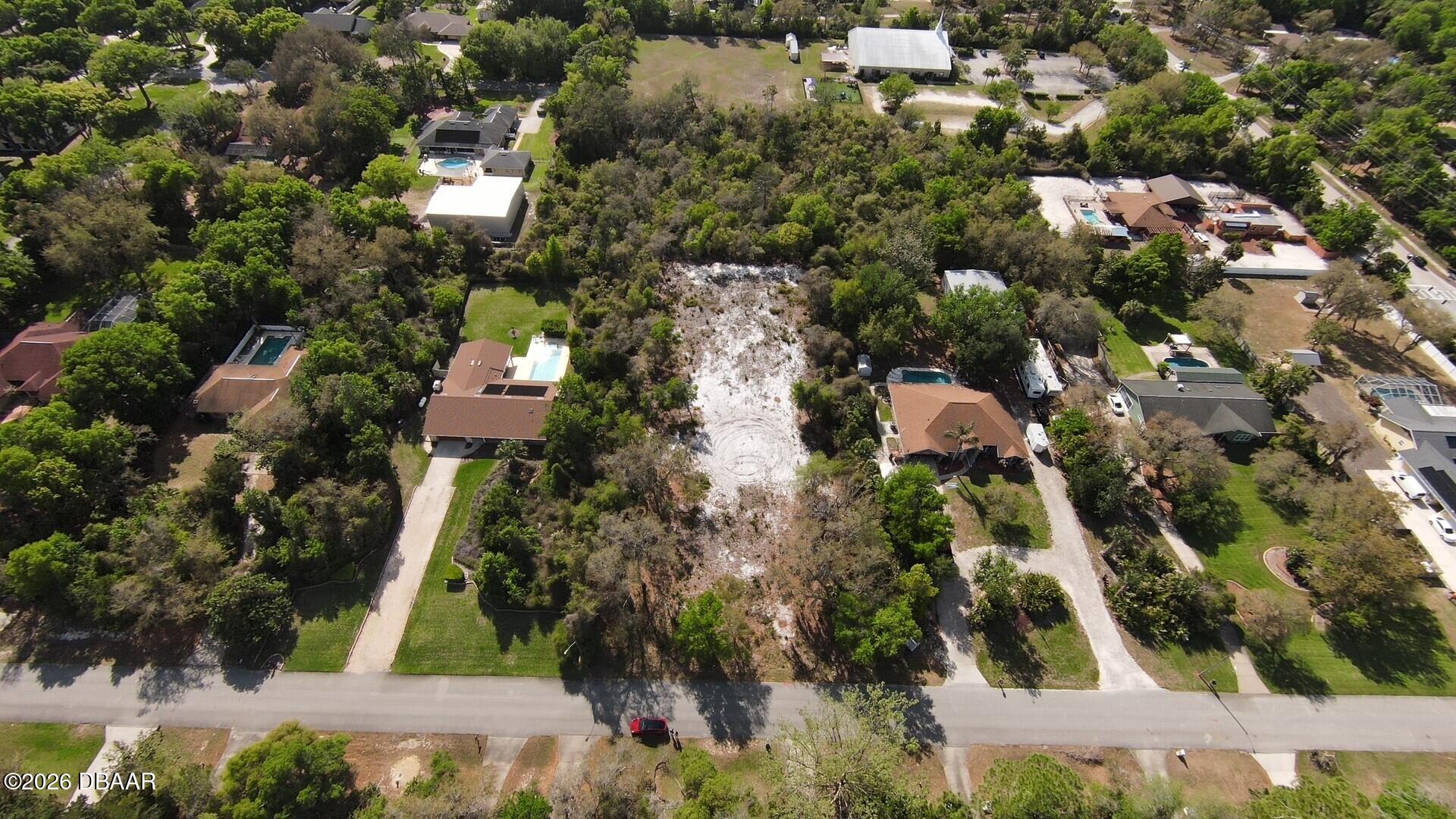 5806 Spruce Creek Woods Drive