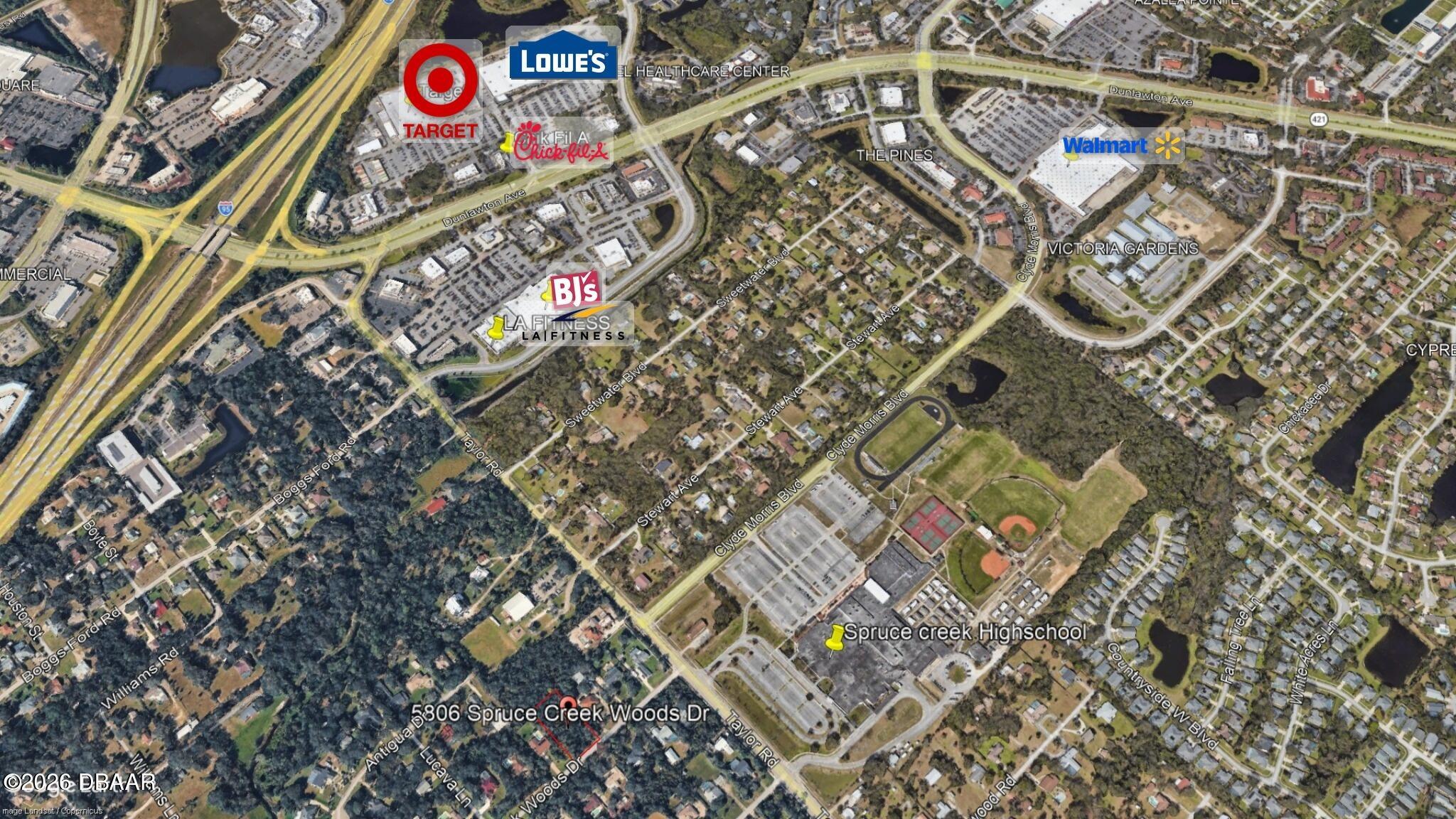 5806 Spruce Creek Woods Drive