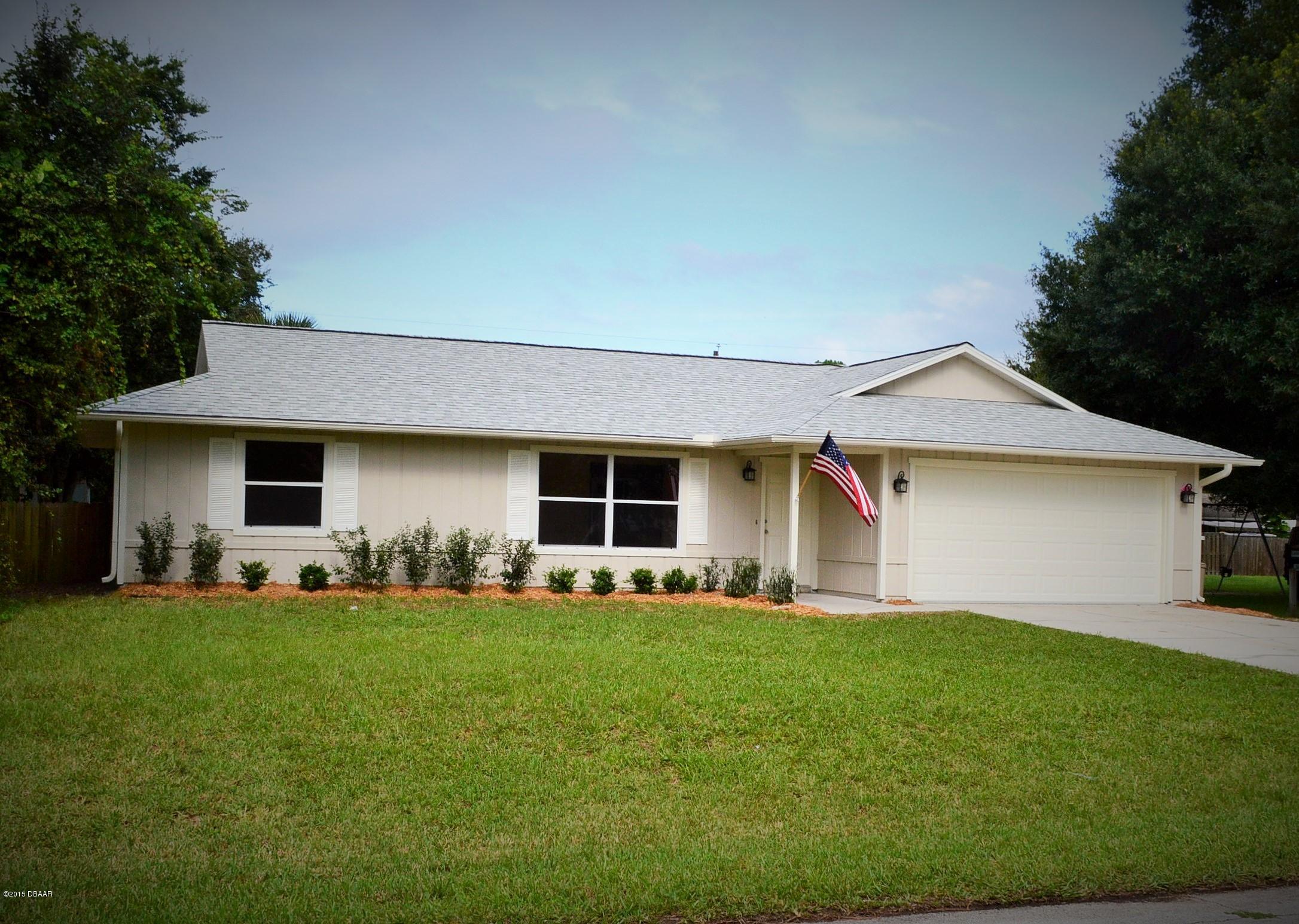 Photo 1 of 19 — 1511 Umbrella Tree Drive, Edgewater, FL 32132
