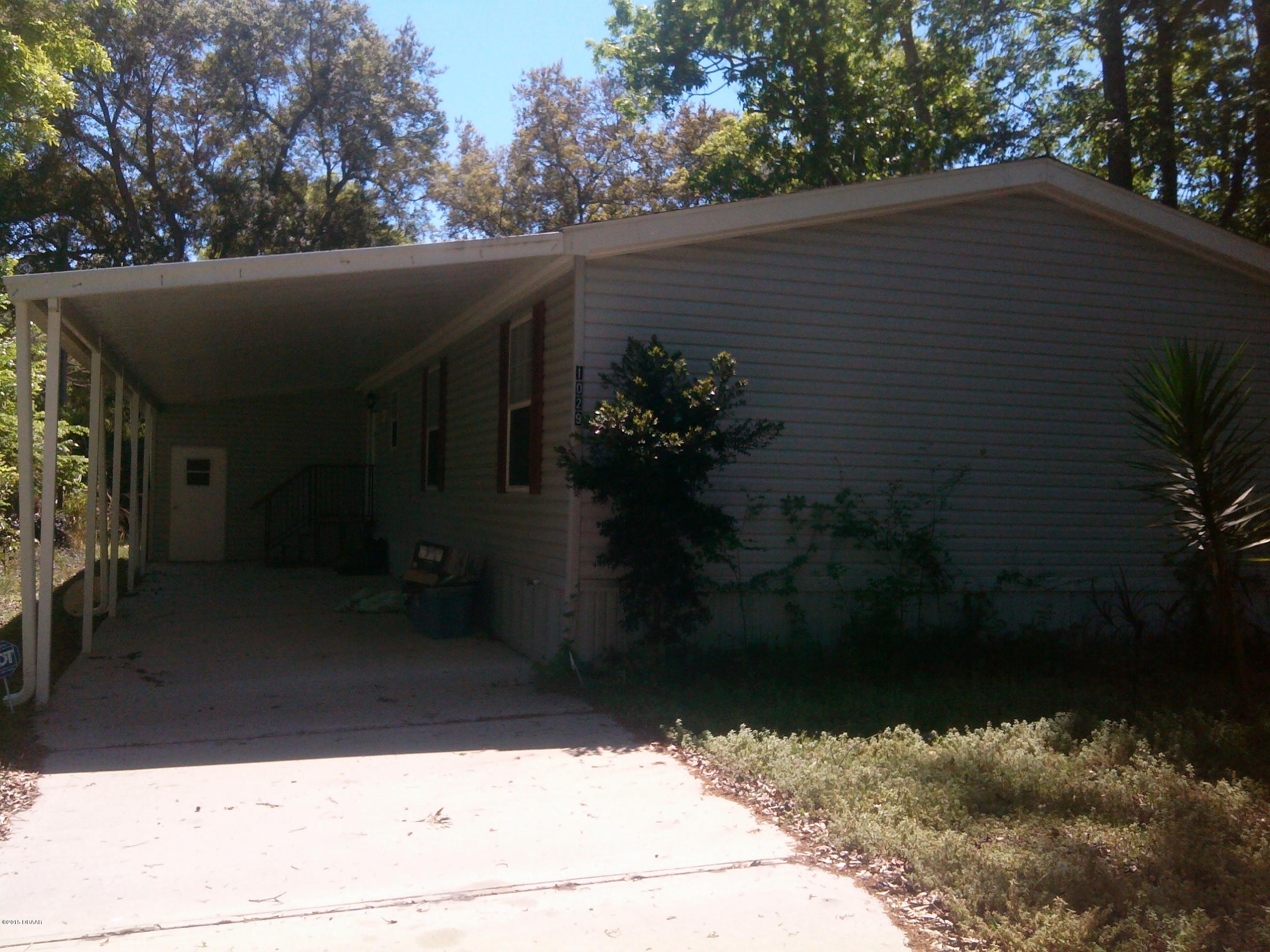 Photo 1 of 12 — 1029 S Green Acres Circle, South Daytona, FL 32119