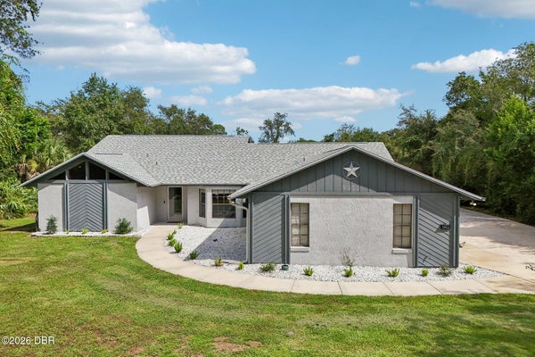 5803 SPRUCE CREEK WOODS DR, PORT ORANGE, FL 32127 - Image 469d7a76c717c30fa712fcd1ed87ff0b/1397004083