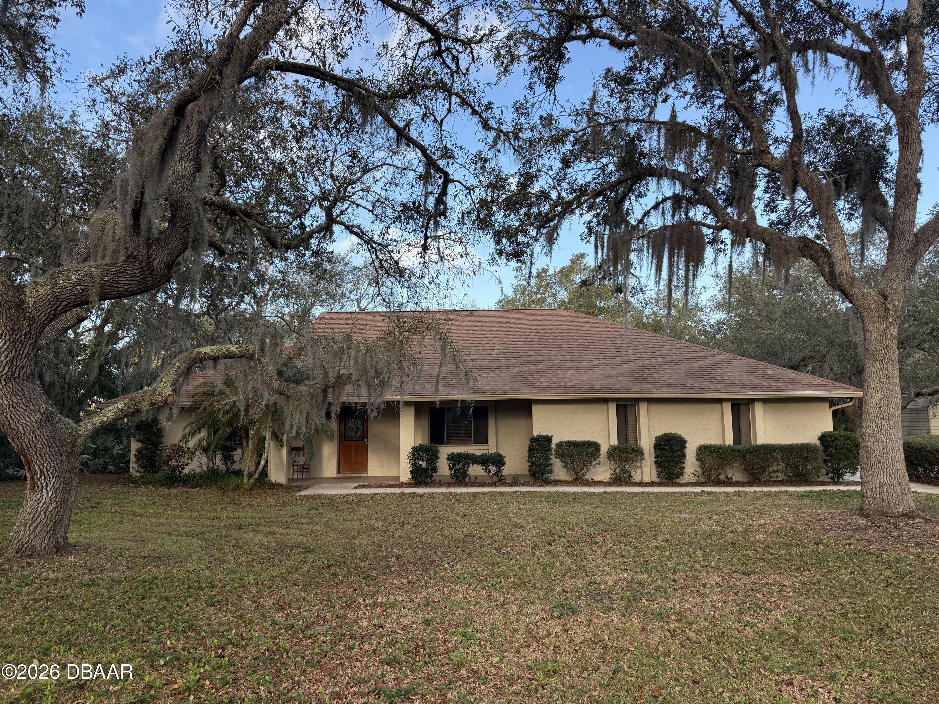 5822 Spruce Creek Woods Drive