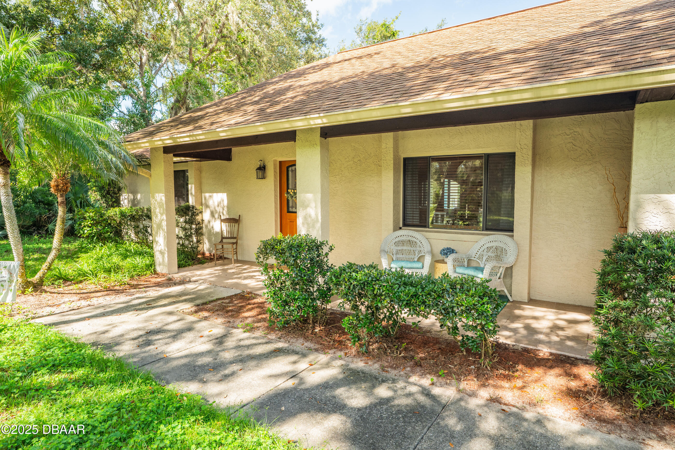 5822 Spruce Creek Woods Drive