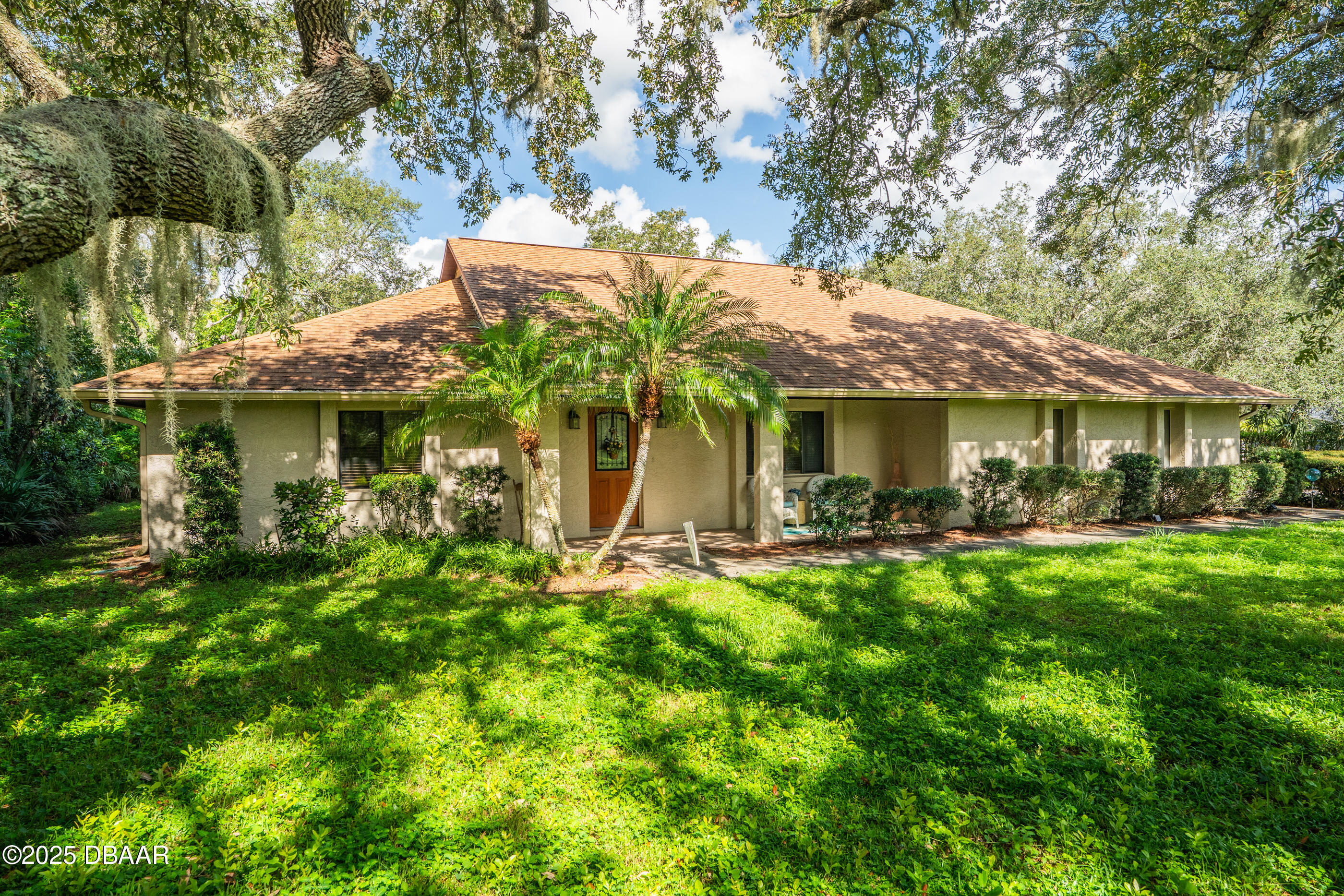 5822 Spruce Creek Woods Drive