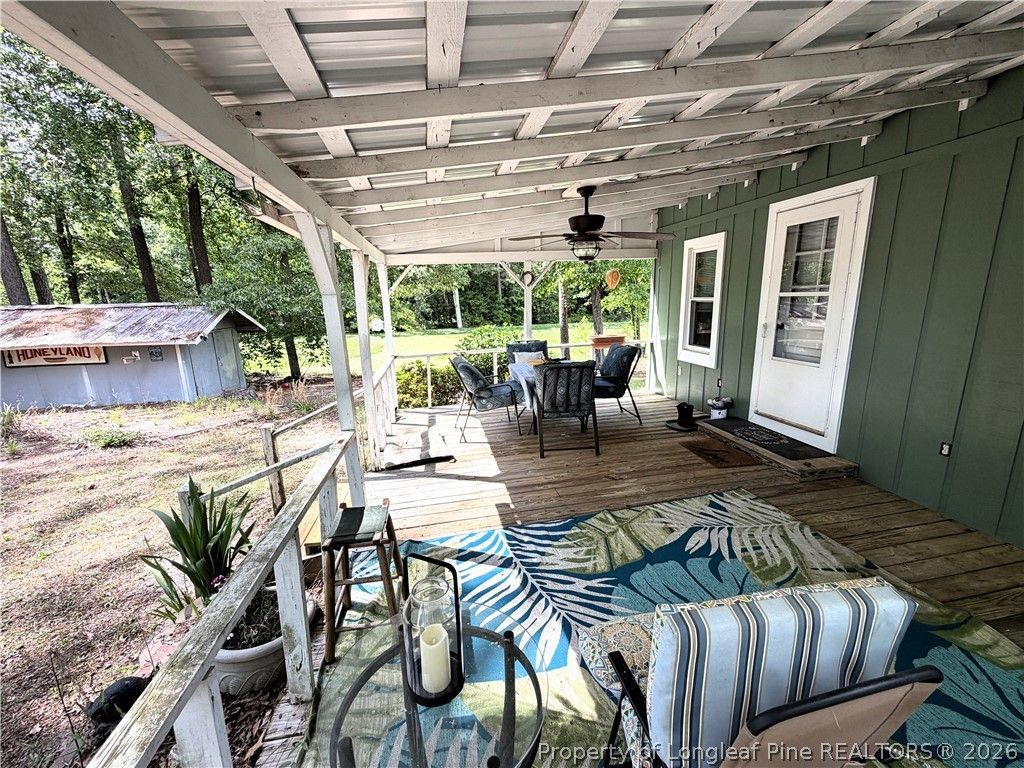 Photo of 132 &amp; 14 Strickland Cabin Lane, Salemburg, NC 28385 (MLS # 761391)