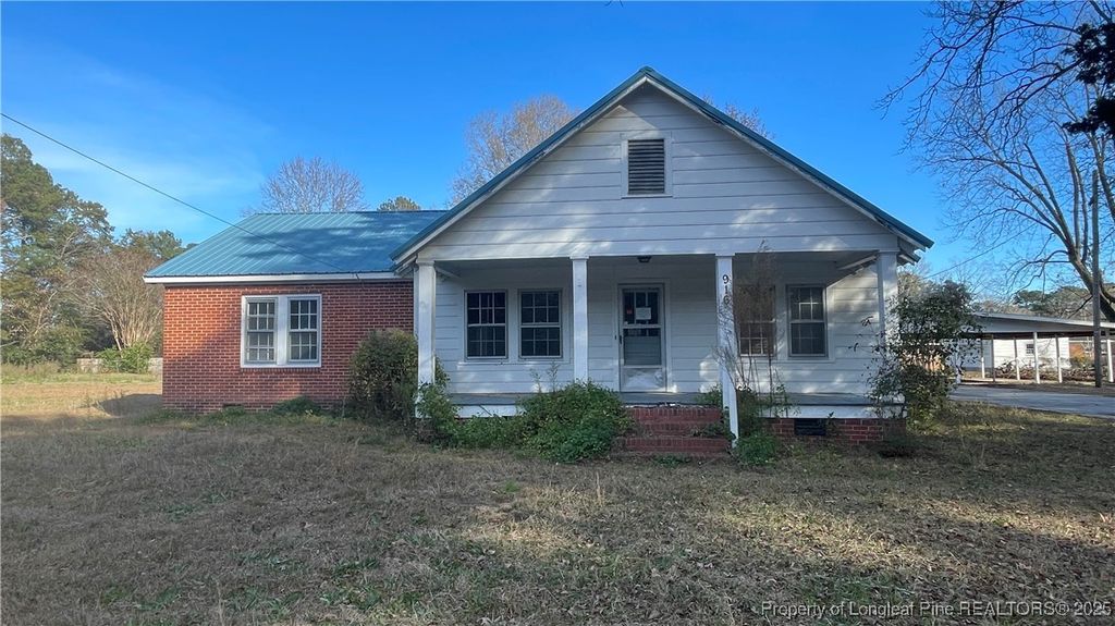 Photo of 916 Aberdeen Road, Laurinburg, NC 28352 (MLS # 754556)