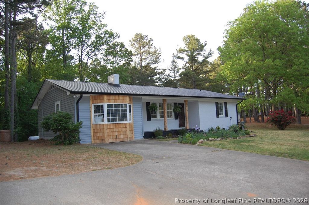 Photo of 3839 Avents Ferry Road, Sanford, NC 27330 (MLS # 760996)