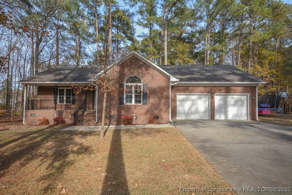 Photo of 31 Crystal Point, Sanford, NC 27332 (MLS # 754741)