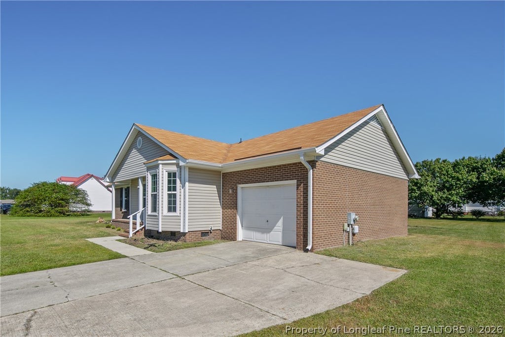 Photo of 8463 Brightleaf Drive, St Pauls, NC 28384 (MLS # 770234)