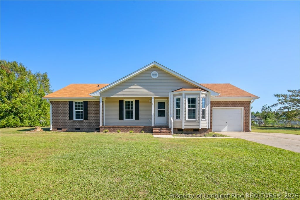 Photo of 8463 Brightleaf Drive, St Pauls, NC 28384 (MLS # 770234)