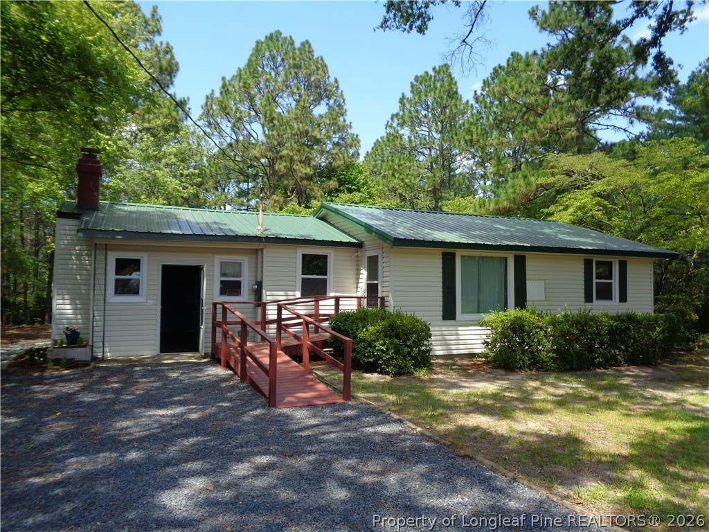 Photo of 303 Archie Road, West End, NC 27376 (MLS # 767484)