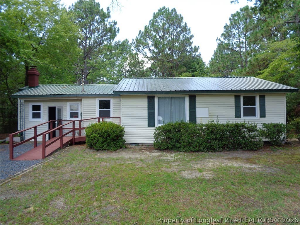 Photo of 303 Archie Road, West End, NC 27376 (MLS # 767484)
