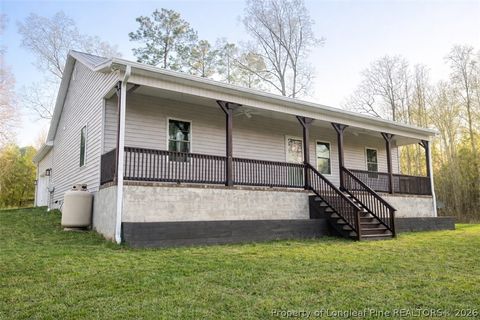 Photo of 546 Rubicon Road, West End, NC 27376 (MLS # 766281)