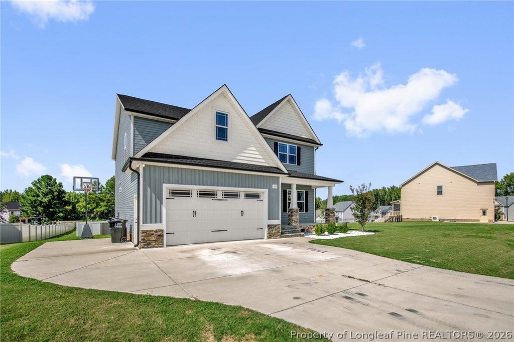 Photo of 105 Hampshire Courts, Four Oaks, NC 27524 (MLS # 768552)
