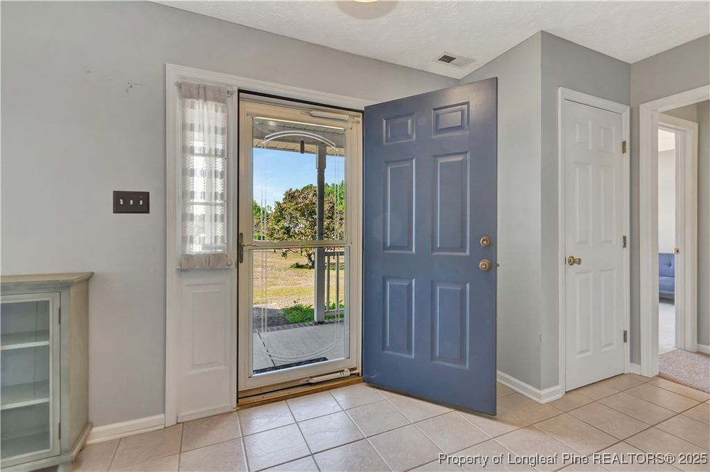 Photo of 7066 Farmland Court, Hope Mills, NC 28348 (MLS # 750067)