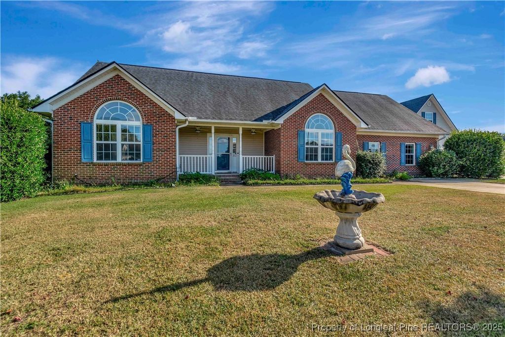 Photo of 7066 Farmland Court, Hope Mills, NC 28348 (MLS # 750067)
