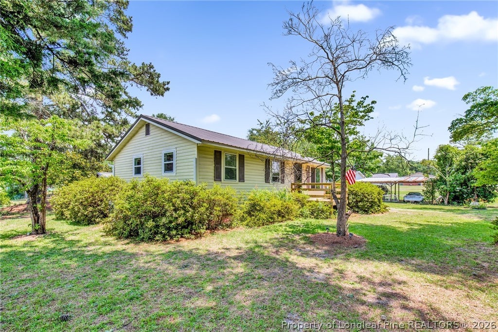 Photo of 219 E Clinton Street, Autryville, NC 28318 (MLS # 763616)