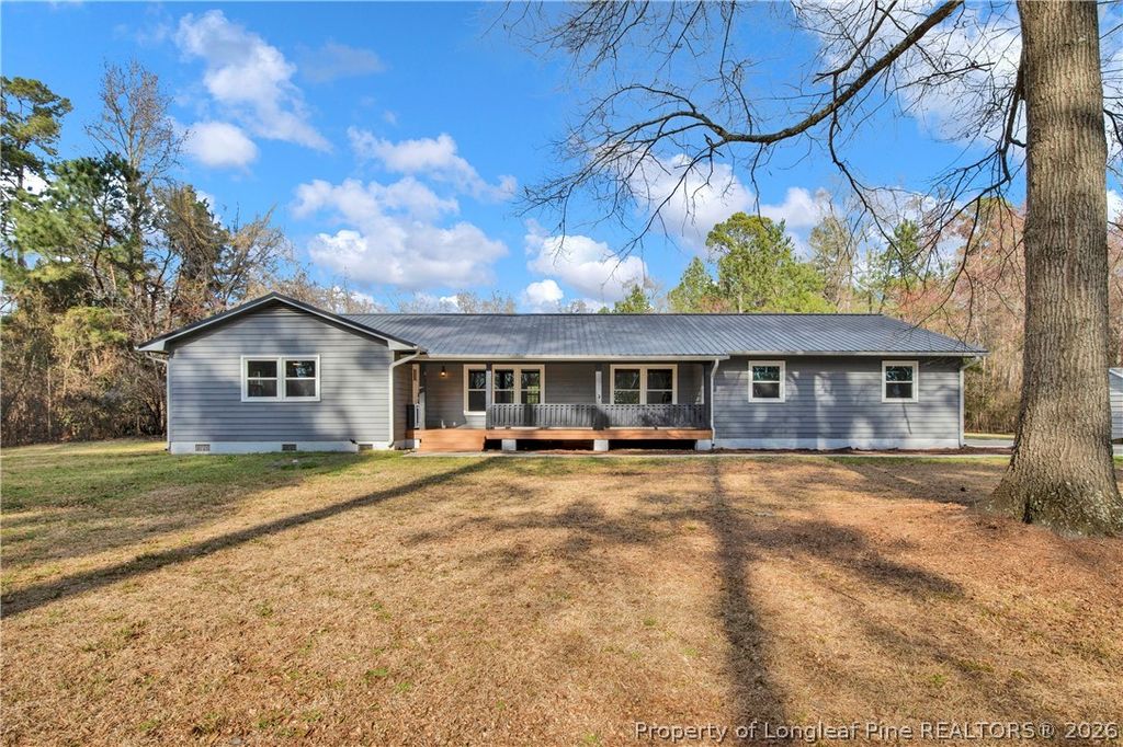 Photo of 305 E Third Street, Parkton, NC 28371 (MLS # 760186)