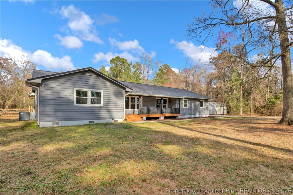 Photo of 305 E Third Street, Parkton, NC 28371 (MLS # 760186)