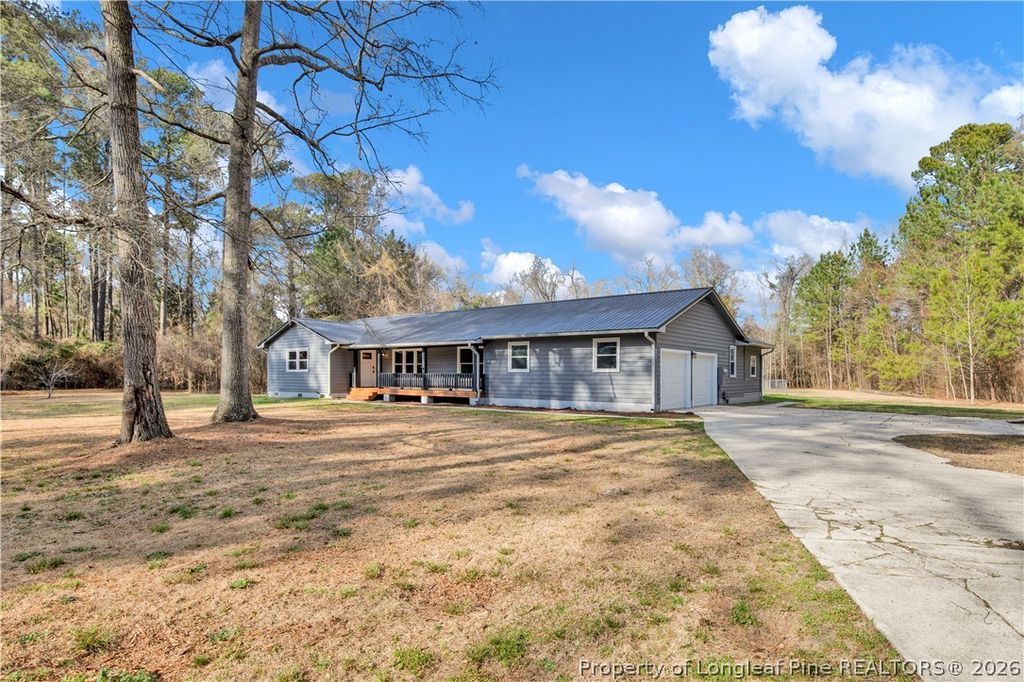 Photo of 305 E Third Street, Parkton, NC 28371 (MLS # 760186)