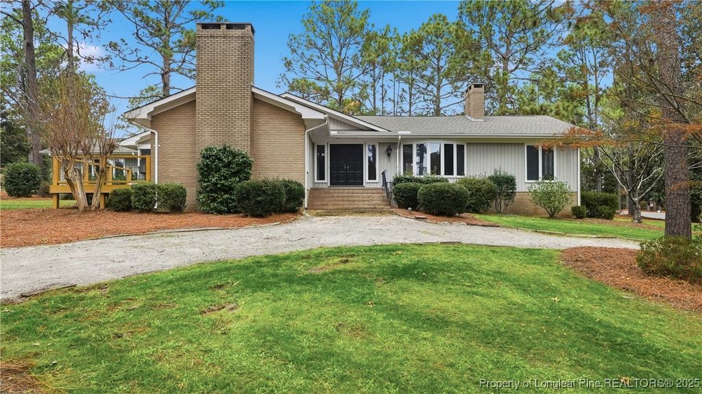 Photo of 1 Country Club Boulevard, Whispering Pines, NC 28327 (MLS # 753973)