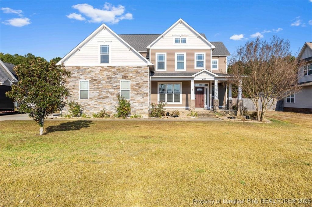 Photo of 400 Oakridge Drive, Raeford, NC 28376 (MLS # 753697)