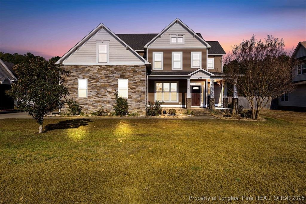 Photo of 400 Oakridge Drive, Raeford, NC 28376 (MLS # 753697)