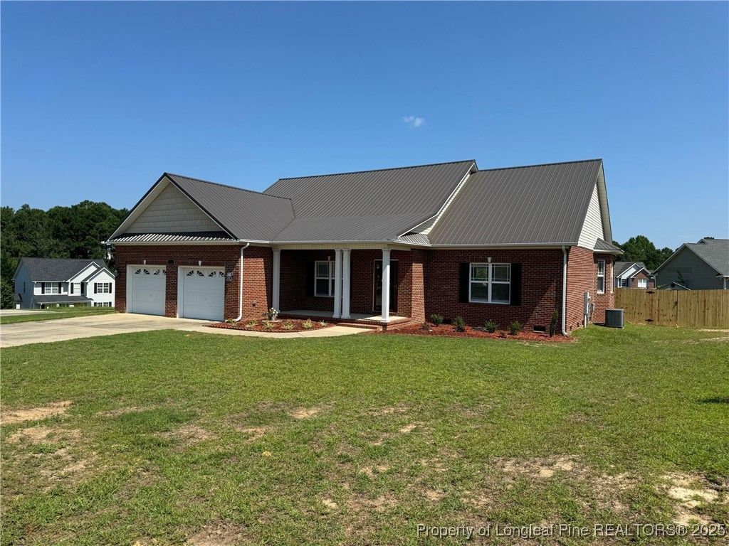 Photo of 655 Plantation Drive, Cameron, NC 28326 (MLS # 752093)