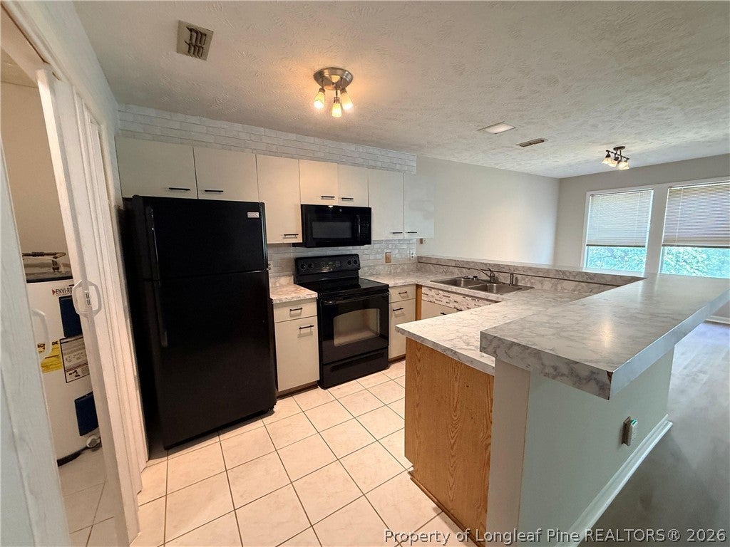 Photo of 6768 Willowbrook Drive #5, Fayetteville, NC 28314 (MLS # 769933)