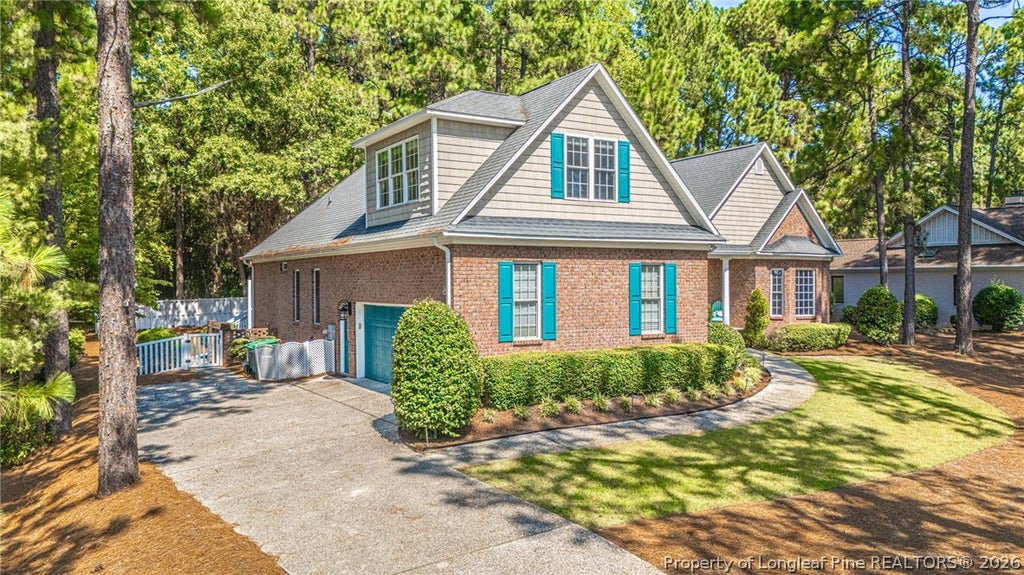 Photo of 725 Lake Forest Drive E, Pinehurst, NC 28374 (MLS # 769438)