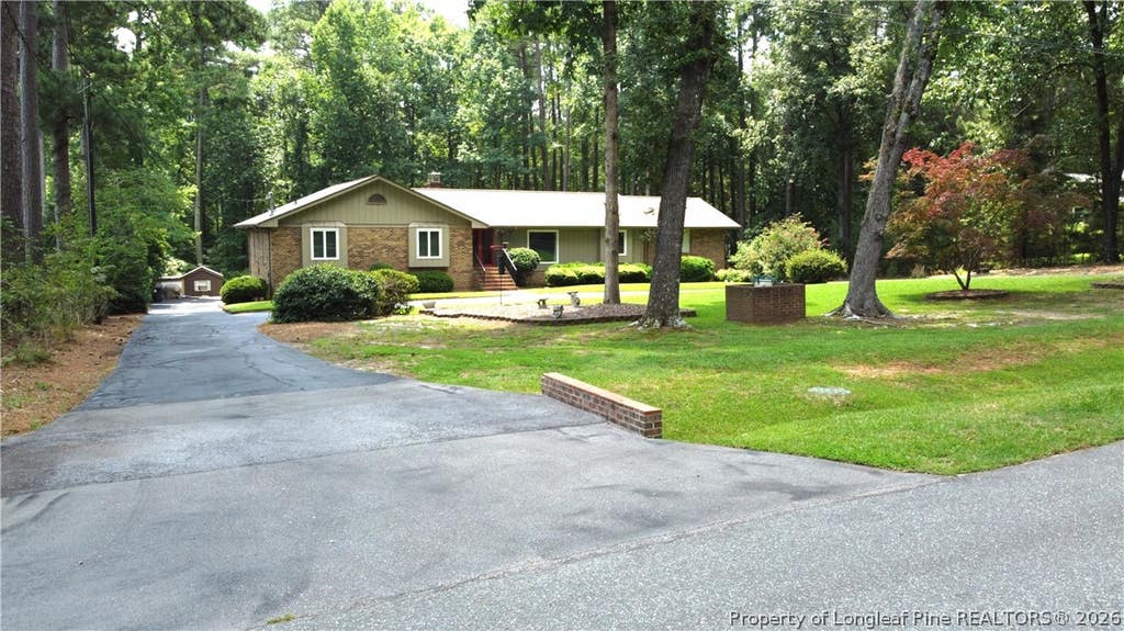 Photo of 607 Pineknoll Drive, Sanford, NC 27330 (MLS # 767383)